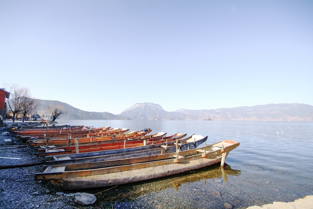 Wooden boats parked on the shore