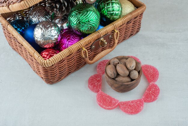 A wooden bowl with nuts on white background. High quality photo