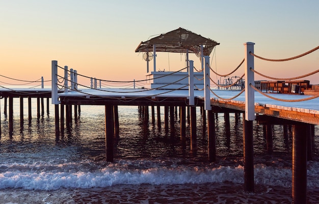 Free photo wooden bridge pier against a beautiful sky