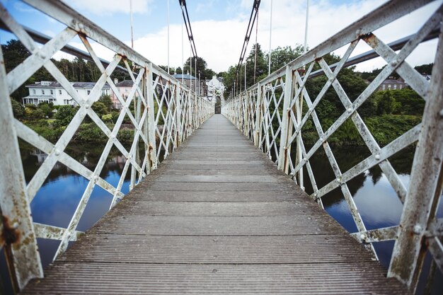 Wooden bridge over the river