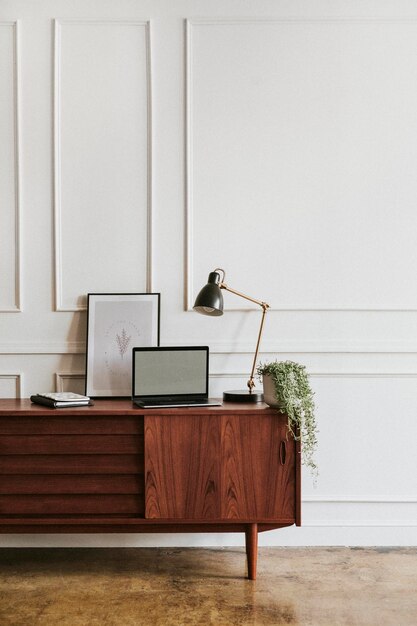 Wooden cabinet against a white wall