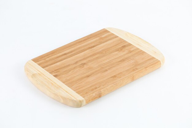 Wooden chopping board isolated on a white background