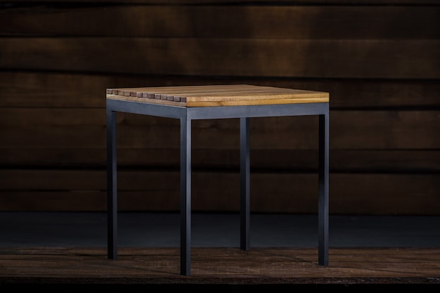 Wooden coffee table with metals legs in the carpenter's workshop