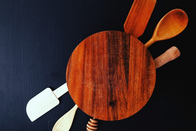 Wooden cooking equipment on kitchen counter