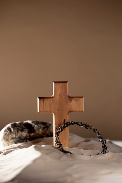 Wooden cross and crown of thorns arrangement