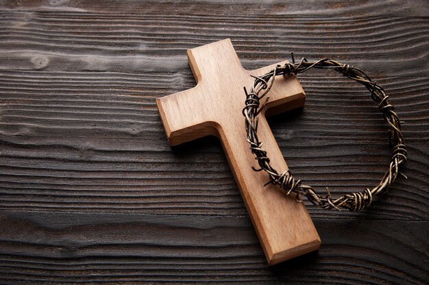 Wooden cross and crown of thorns high angle