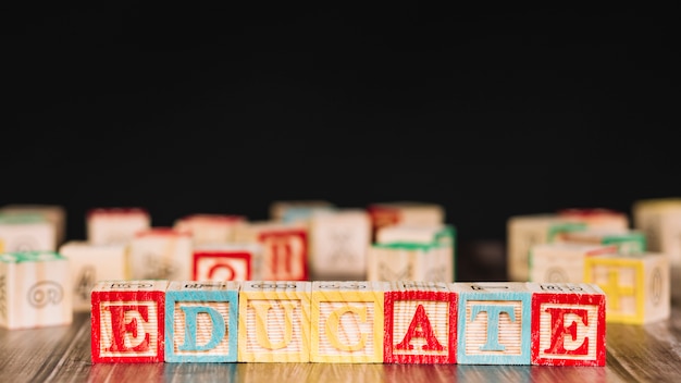 Wooden cubes with educate inscription