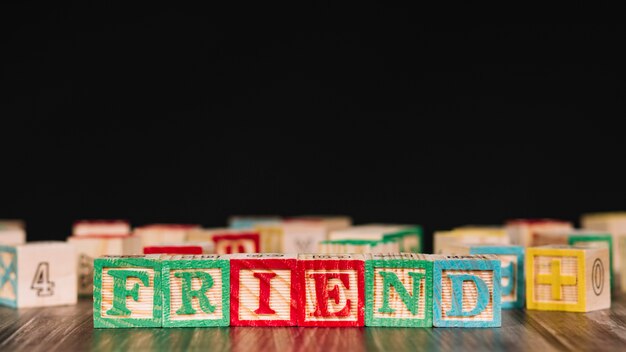 Wooden cubes with friend inscription