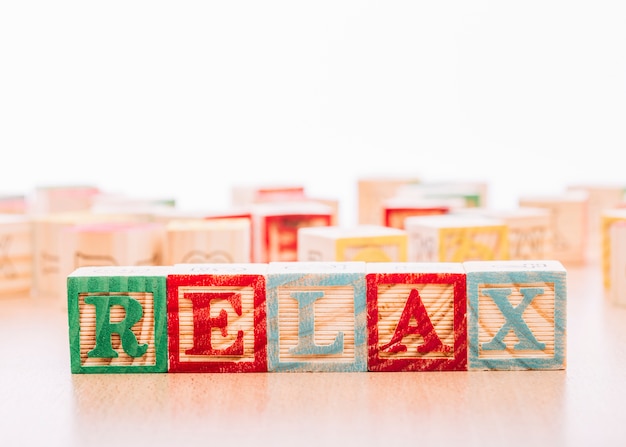 Free photo wooden cubes with relax inscription