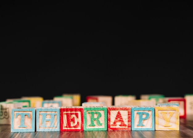 Wooden cubes with therapy inscription