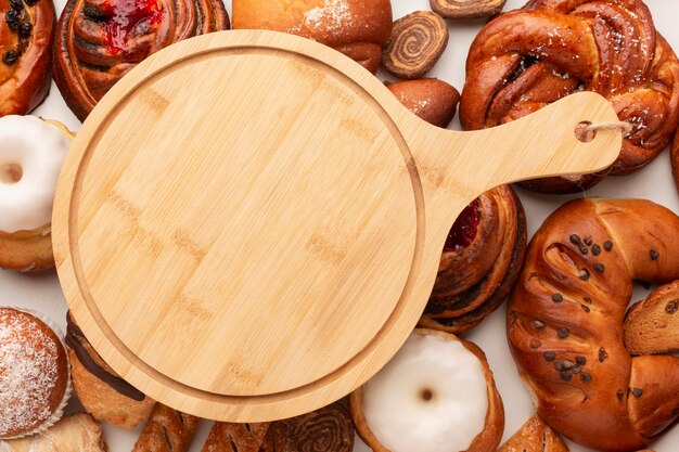 Wooden cutting board with bagels