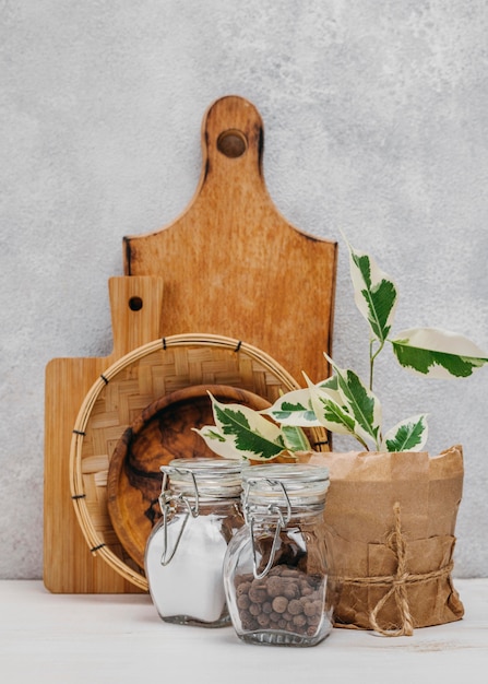 Wooden cutting board with salt and pepper