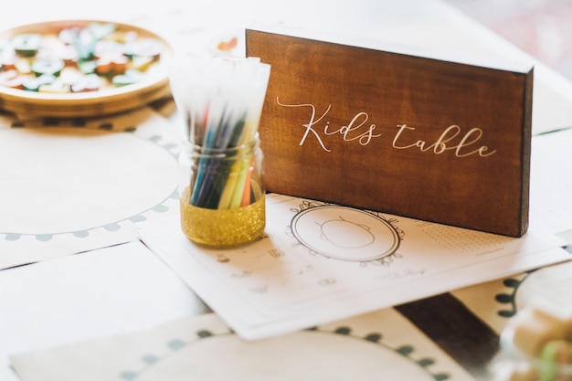 Wooden engraving plate on kids table