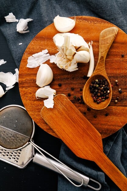 Wooden equipment on kitchen counter with spices