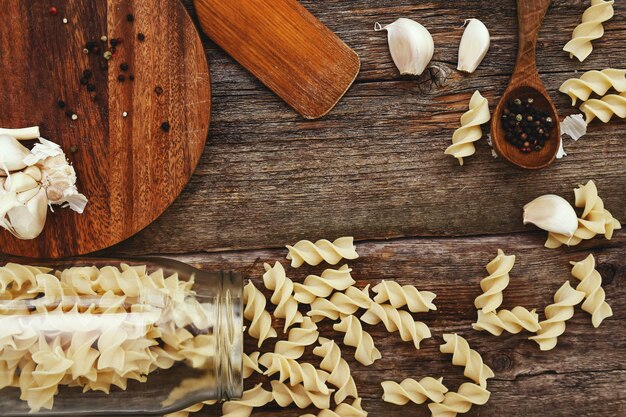 Wooden equipment on kitchen counter with spices