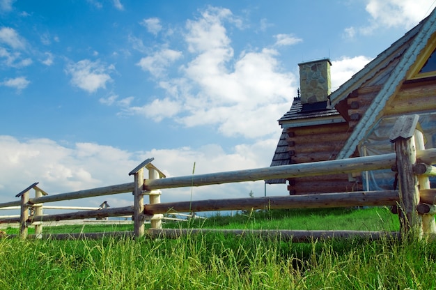 Wooden fence with a house behind