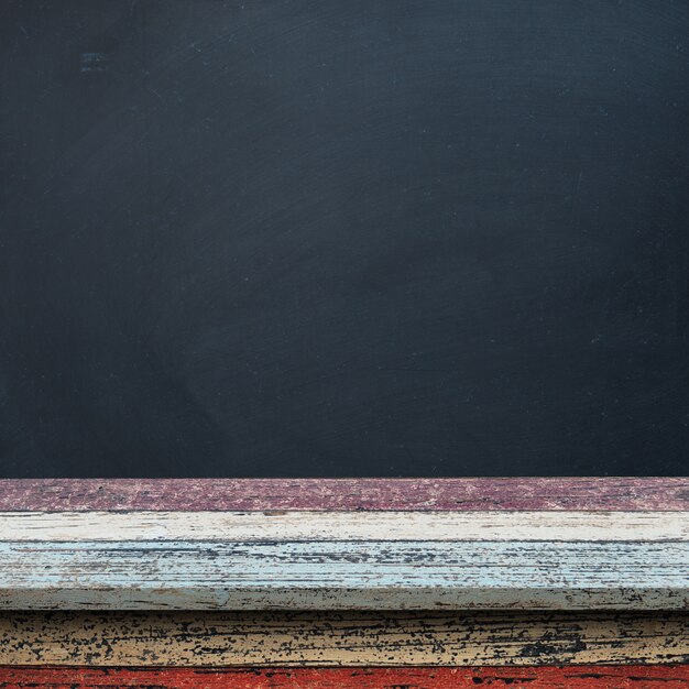 Wooden floor with a blackboard