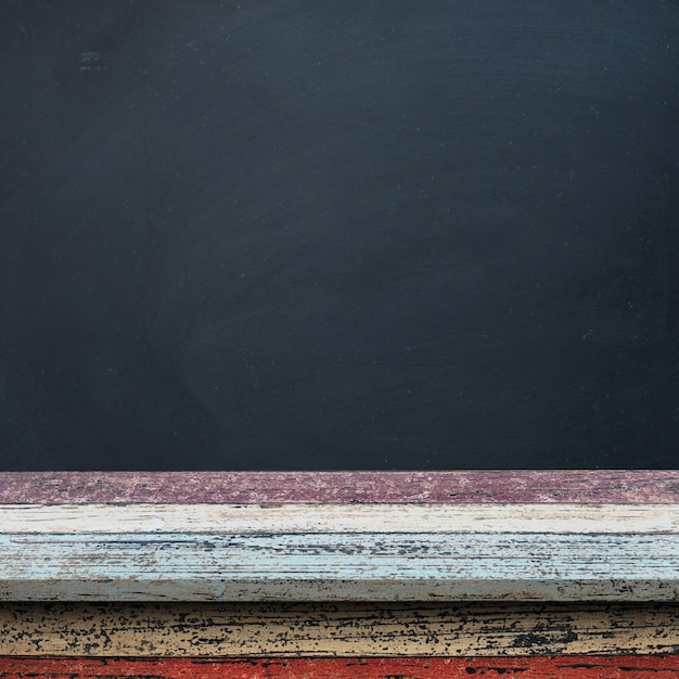 Wooden floor with a blackboard