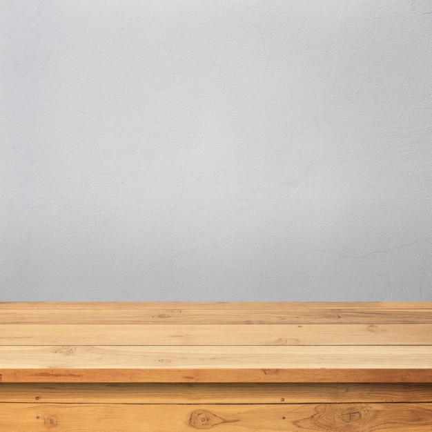 Wooden floor with a concrete wall