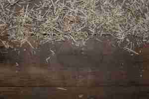 Free photo wooden floor with straw