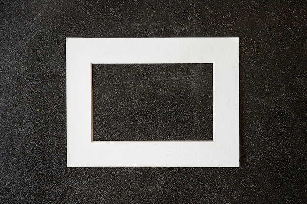 Wooden frame on black table