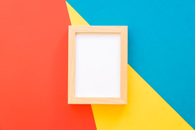 Wooden frame on geometric background