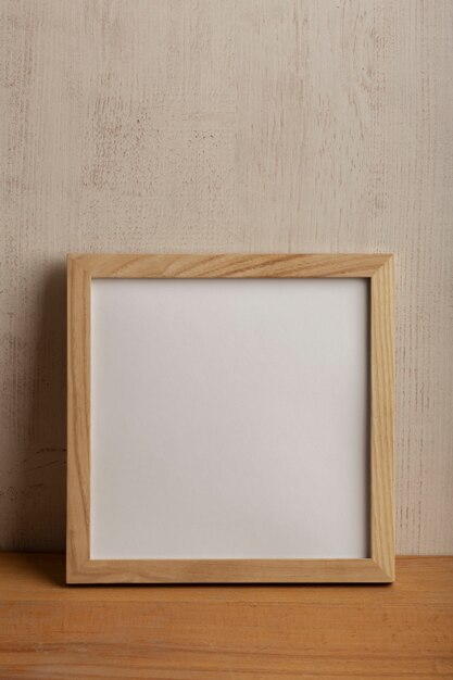 Wooden frame on stucco background