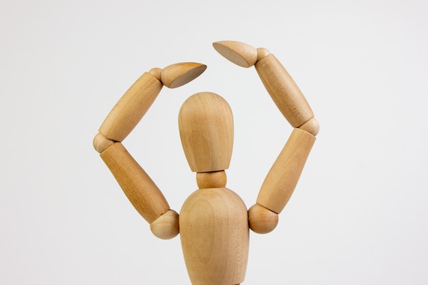 Wooden gestalt poses expression of emotions