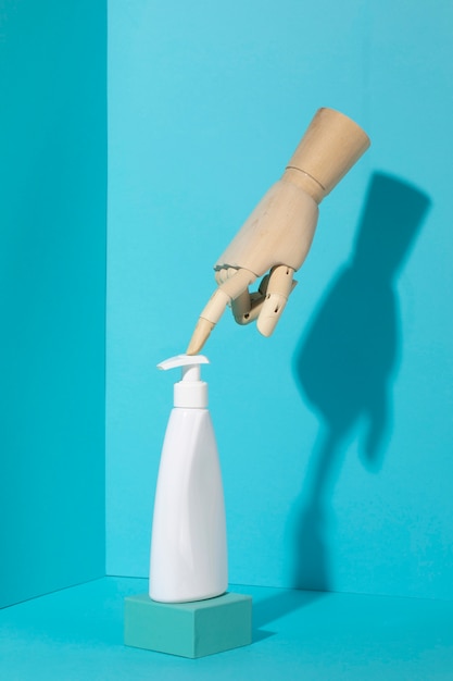 Wooden hand with hygienic soap