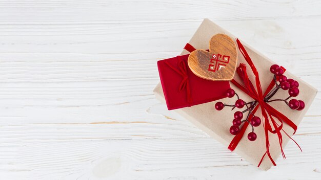 Wooden heart on present boxes 