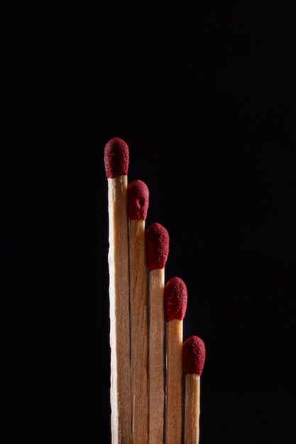 Wooden matches with dark background