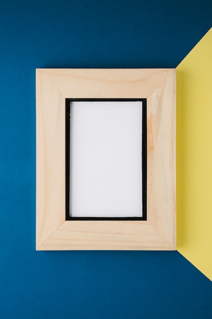 Free photo wooden minimalist frame with empty space