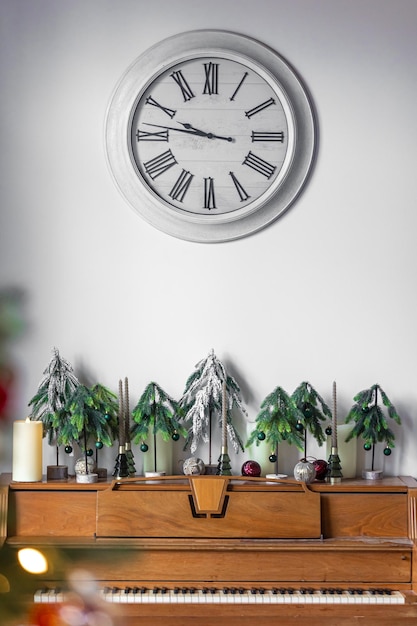 Wooden piano in an interior decorated for christmas