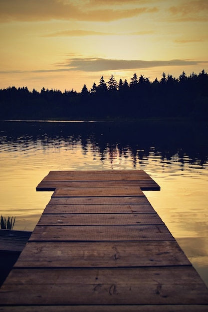 "Wooden pier on lakeside"