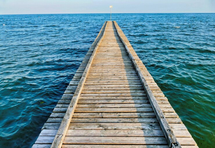 Free Photo wooden pier in the turquoise water of the sea