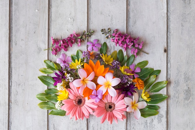 Wooden planks with colored flowers