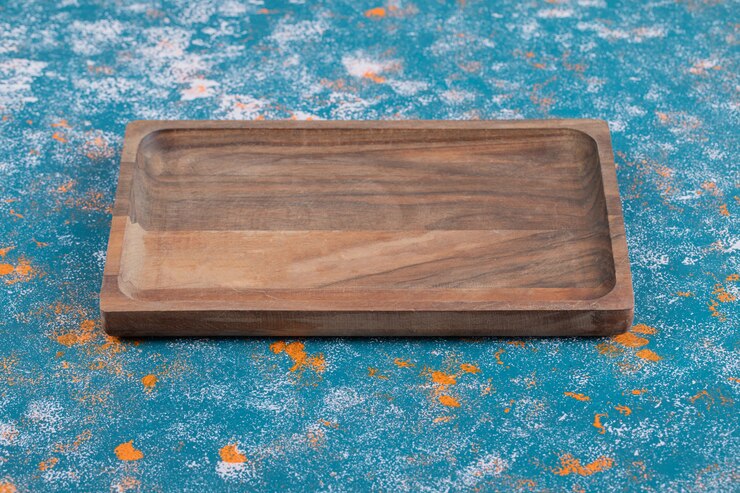Free Photo wooden platter isolated on textured background