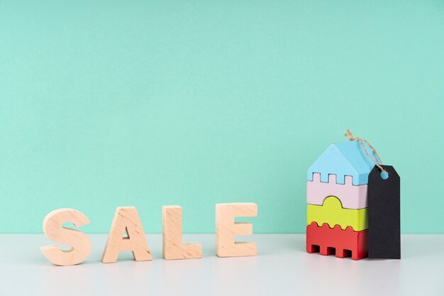 Wooden sale lettering on blue background