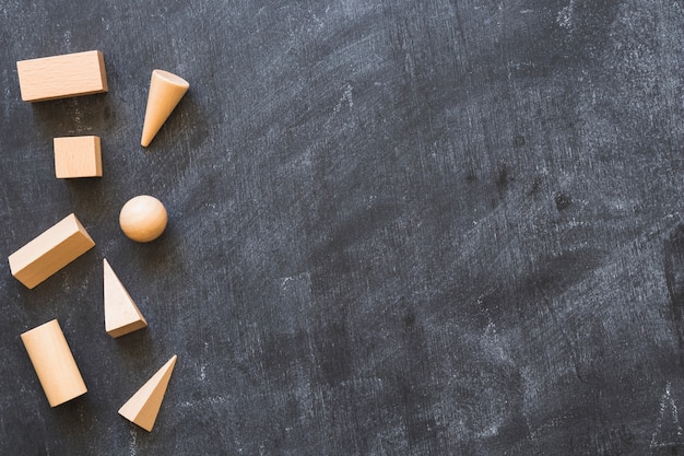 Wooden shapes on backboard 