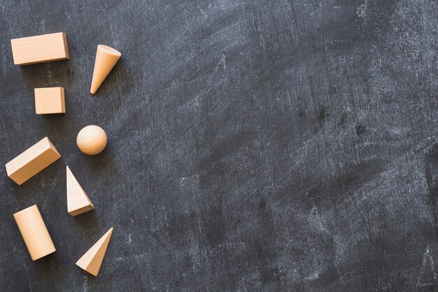 Wooden shapes on backboard 