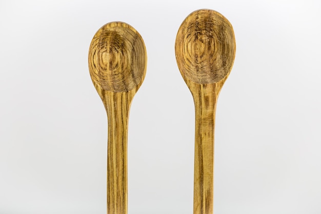 Wooden spoons on white surface