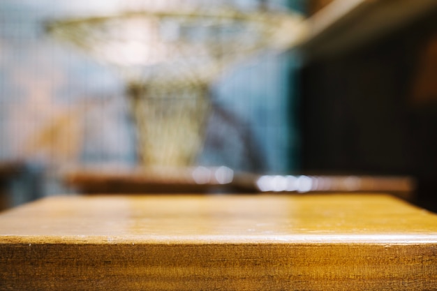 Wooden stool on blurred background