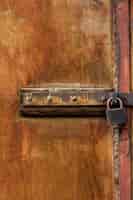 Free photo wooden structure with rusty metal lock