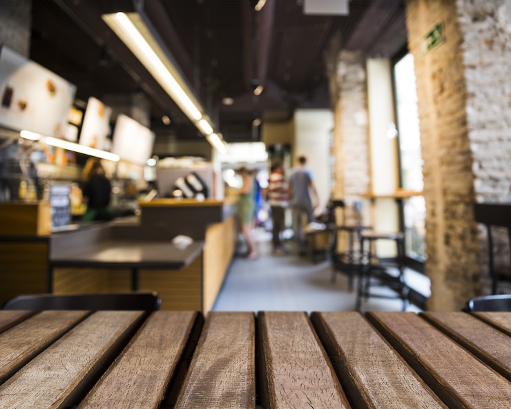 Free Photo wooden surface looking out to bar scene