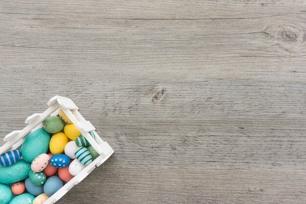 Wooden surface with decorative easter eggs