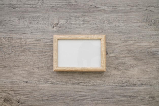 Free photo wooden surface with decorative frame