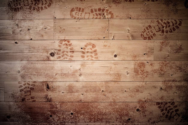 Free photo wooden surface with footprints on it - great for background or a blog