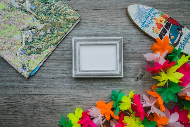 Wooden surface with frame and summer items