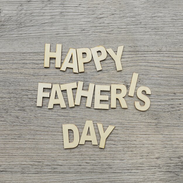 Wooden surface with letters for father's day