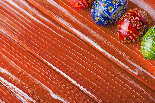 Wooden surface with several eggs for easter day